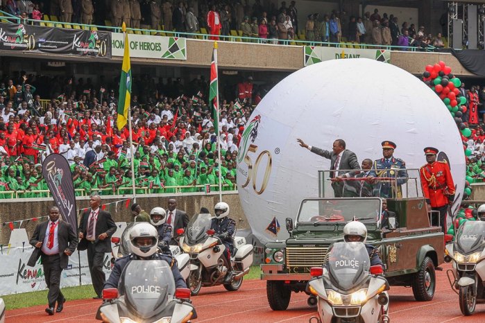 President Kenyatta is driven through the Kenya at 50 celebration grounds