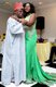 The celebrant dances with her dad