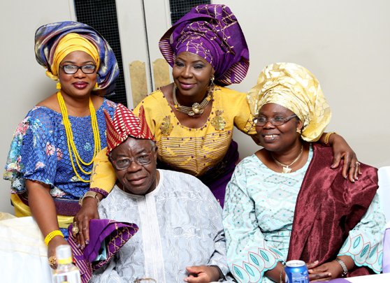 The celebrant poses with her dad - Pa Olunlade and his wife