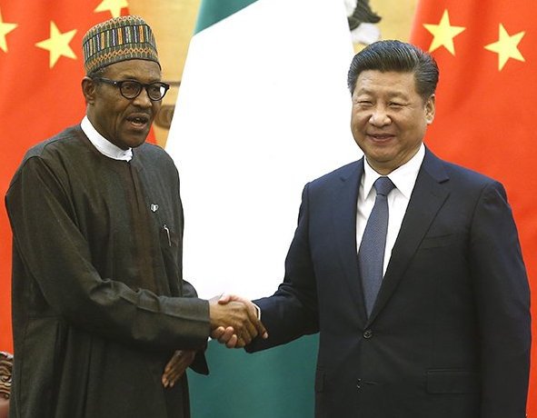 Chinese President Xi Jinping with Nigerian President Muhammadu Buhari in Beijing