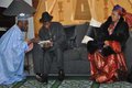 President Goodluck Jonathan going through a document with Nigerian High Commissioner, Amb Dalhatu Tafida on arrival of the President and First Lady Dame Patience.jpg