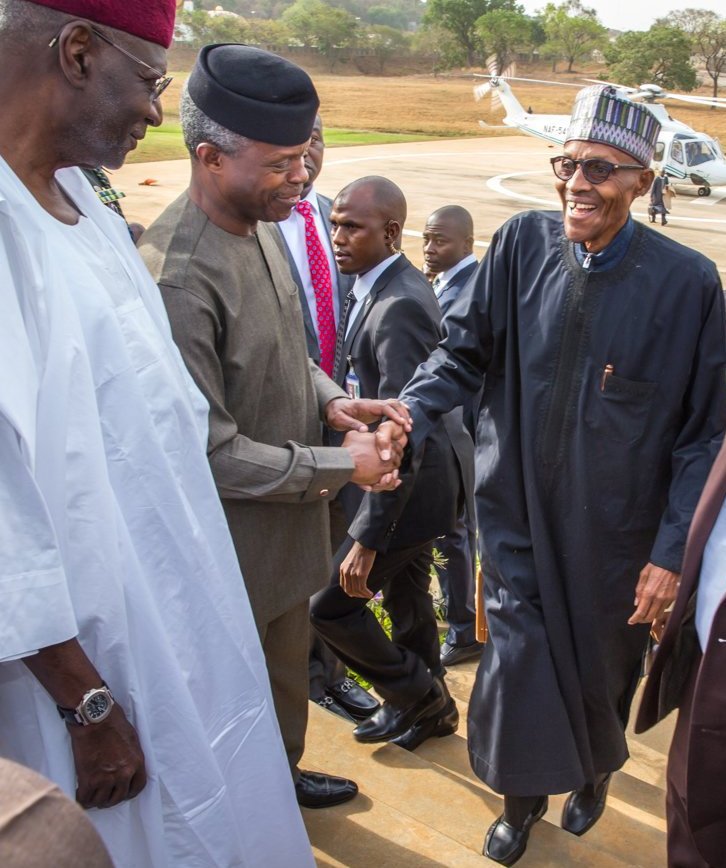 Acting President Yemi Osinbajo welcomes President Buhari at Aso Rock Helipad