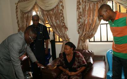 Kwara State Governor -  Dr Abdulfatah Ahmed, Uncle of late Commissioner of Police -  Mr. Ejike Asadu,  his Widow - Mrs Oby Asadu and Son - Mr Onyekachi Asadu, during the Governor's visit to the deceased's family house in Enugu