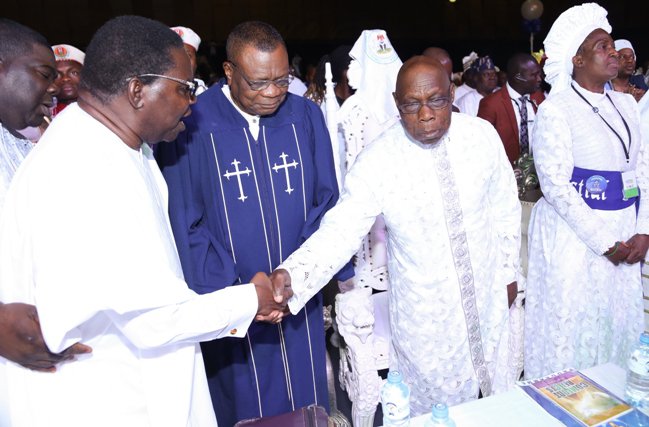 Chief Obasanjo greets Ebenezer Obey-Fabiyi (far left) in the company of Pastor S.K. Abiara and Rev Esther Ajayi.jpg