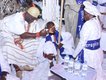 Ooni beckons to Rev Ajayi to move closer.jpg