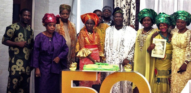 Members of the COP branch of the Christ Apostolic Church with the celebrant b.jpg