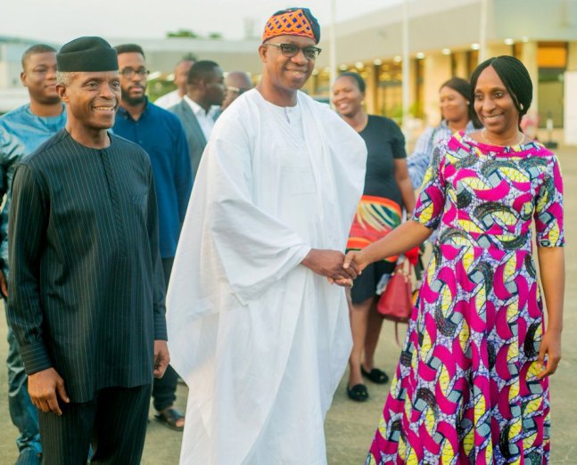 Being congratulated by Vice President Yemi Osinbajo and his wife Dolapo.jpg