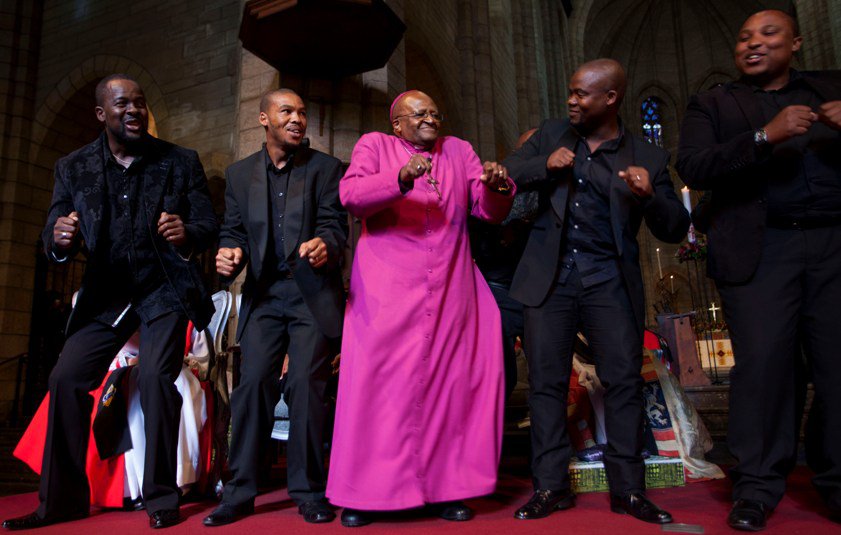 Tutu celebrating Templeton Prize win with members of the Cape Town Opera Voice of the Nation Ensemble