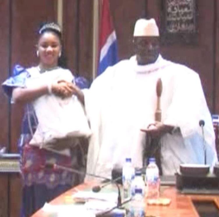 Fatou (Toufah) Jallow receiving award from President Jammeh as winner of the Miss July 22 Pageant in 2014