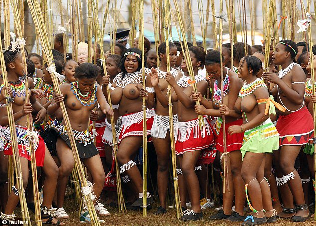Culture: The Reed Dance ceremony, pictured, is known as Umhlanga