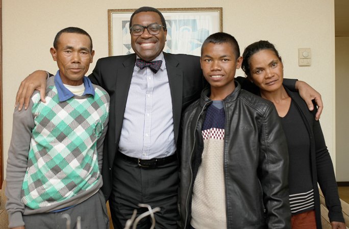 Akinwumi A Adesina poses with Anthony's family