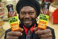 Levi Roots proudly shows off his Reggae Reggae Sauce