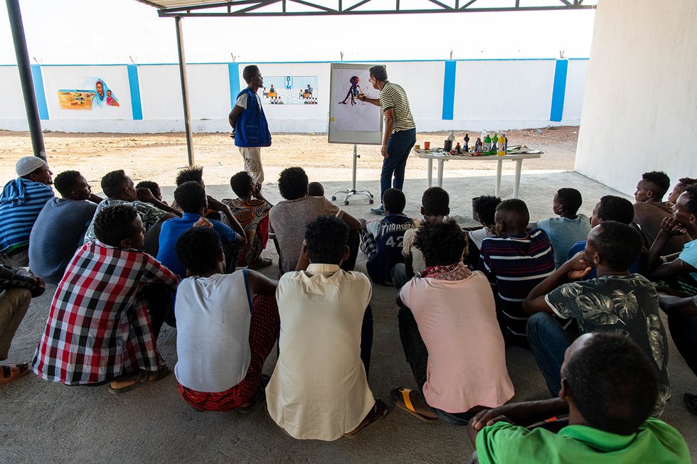 Migrants at the MRC participate in a social activity aimed at raising awareness on the risks and dangers of irregular migration