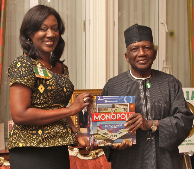 Mrs Nimi Akinkugbe, CEO Bestman Games presenting The City Of Lagos Edition of Monopoly to H.E Dr Dalhatu Sarki Tafida CFR, Nigeria's High Commissioner to the UK