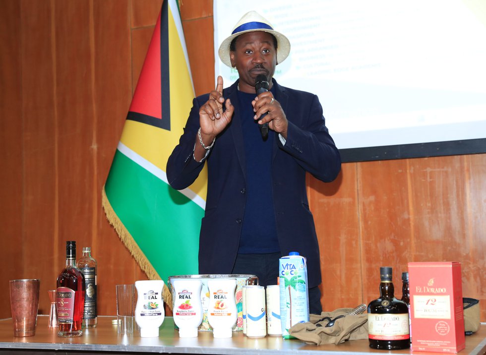 Global Rum Ambassador Ian Burrell delivering mixology presentation at Guyana Diaspora Sustainability &amp; Investment Conference 2023