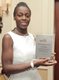 Tara Adeagbo shows off her award plaque